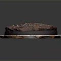 Delicious Chocolate Cake with Chocolate Frosting and Colorful Sprinkles on Floral Pattern Plate Black Background