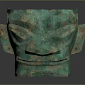 Ancient Bronze Mask Sculpture With Intricate Facial Features And Patina Green Surface