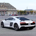 White Audi Sports Car Exterior Design With Red Wheels And Black Accents