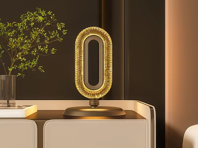 Golden Oval Table Lamp With Beaded Trim On Beige Cabinet Near Green Plants 3d model