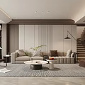 Modern Living Room With Beige Sofa Brown Armchair Round Coffee Table And Green Plant