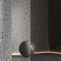Terrazzo Wall With Color Swatches Display And Decorative Sphere In Various Tones