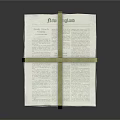 Organized Stack of Books and Magazines Tied with String on Dark Background