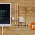 Xiaomi New Digital Accessories With Chargers Data Cables And Tablet Display On Wooden Surface
