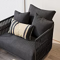 Elegant Single Sofa Featuring Grey Fabric Black Woven Frame And Striped Beige Cushions 3d model