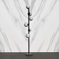Modern Floor Lamp With Black Metal Stand And Multiple White Globe Shades For Home Interior