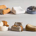 Stylish Bean Bag Chairs In Various Colors With Cozy Blankets For Living Room