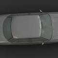 Vintage Dark Gray Sedan With Illuminated Headlights And Silver Rims
