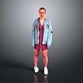 A Woman Wearing Blue Denim Jacket With Patches And Pink Floral Dress And White Sneakers