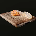Roasted Chicken Drumsticks With Bread Slices On Wooden Cutting Board And Black Peppercorns