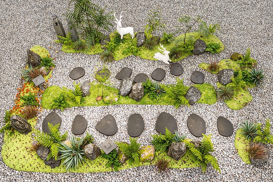 Natural Courtyard Garden Design With Pebble Ground Stones Pathway Foliage And Deer Statues 3d model 