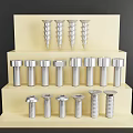 Various Types of Hardware Tools Screws and Bolts Arranged on Layered Display Stand