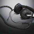 Black Over Ear Headphones With Coiled Cable For High Quality Audio Experience