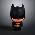 Cute Black Batman Chibi Style Toy Figure With Orange Chest Logo And Yellow Utility Belt