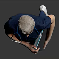 Medical Professional In Blue Scrubs With Stethoscope And Clipboard Standing Against Gray Background