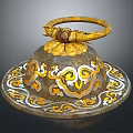 Ancient Decorative Artifact with Golden Circular Handle and Intricate Base Patterns 3d model
