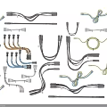 Assorted Colored Electrical Cables With Plugs And Connectors On Gray Surface