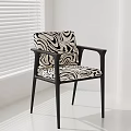 Modern Dining Chair With Zebra Pattern Upholstery Black Frame And Armrests
