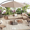 Outdoor Sectional Sofa With Patio Umbrella Lush Plants And Wooden Deck Coffee Table