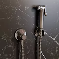 Elegant Modern Handheld Shower with Chrome Finish and Control Knob Mounted on Marble Wall 3d model