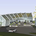 Spacious Indoor Public Space Featuring Curved Roof Glass Walls Palm Trees And Circular Water Pools