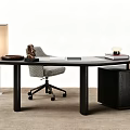 Modern Black Curved Desk With Grey Rolling Chair Side Cabinet And Table Lamp