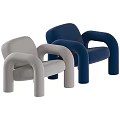 Modern Curved Armchairs In Beige And Black Upholstered For Contemporary Living Spaces