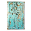 Vintage Blue Wooden Door With Distressed Paint And Carved Leaf Patterns