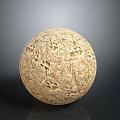 Detailed Wooden Stone Sphere With Intricate Carved Patterns And Natural Textured Surface