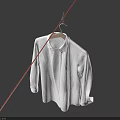 White Shirt Hanging on a Hanger Against Dark Blue Background
