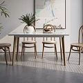 Dining Table Set With White Tabletop And Rattan Wooden Chairs Green Plant And Wall Art