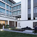 Modern Chinese Style Hospital Building With White Exterior Symmetrical Design Lawn And Road Front