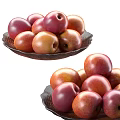 Fresh Ripe Plums in Dark Plates with Reddish Brown and Yellow Skin
