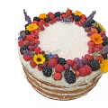 Delicious Naked Cake Topped With Fresh Berries And Colorful Flower Decorations