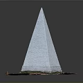White Pyramid Architectural Structure with Green Grass at the Base and Stone Design