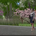 Woman Walking In Garden With Palm Trees Green Plants Purple Flowers And Cactus