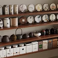 Various Tea Cans Teapots And Ceramic Sets Display On Wooden Shelves