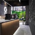 Modern Café Interior Featuring Wooden Counter Glass Display Case Fresh Pastries Staircase And Neon Lighting