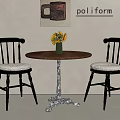 Comfortable Casual Chairs With Upholstered Seats Round Table Yellow Flower Vase And Wall Painting
