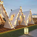 Outdoor Restaurant With White Tents String Lights Tables Chairs Green Plants Pebble Ground Evening