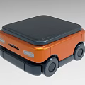 Orange And Black Industrial Equipment With Mobile Wheels And Compact Black Top Design