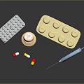 Various Medical Supplies Including Pill Bottle Blister Pack Capsules And Syringe