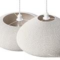 Two Beige Knitted Dome Pendant Lights With Warm Glow For Modern Interior Spaces