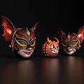Ornate Decorative Ornament Set With Two Bat Wing Masks And Orange Little Devil Figurine