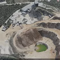 Open Pit Terrain With Green Pond Sandy Slopes And Surrounding Vegetation 3d model