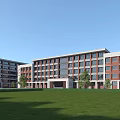 Modern School Building Complex With Red Brick Exteriors White Walls Green Lawn And Trees