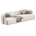 Modern Cream Multi Person Sofa With Soft Cushions And Plaid Blanket