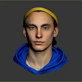Portrait of a Man Wearing Yellow Headband and Blue Hoodie Against Gray Background