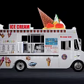 White Ice Cream Truck With Top Cone Decorations Side Graphics And Signage