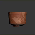 Red Carved Sculpture Bowl With Intricate Patterns On Dark Background